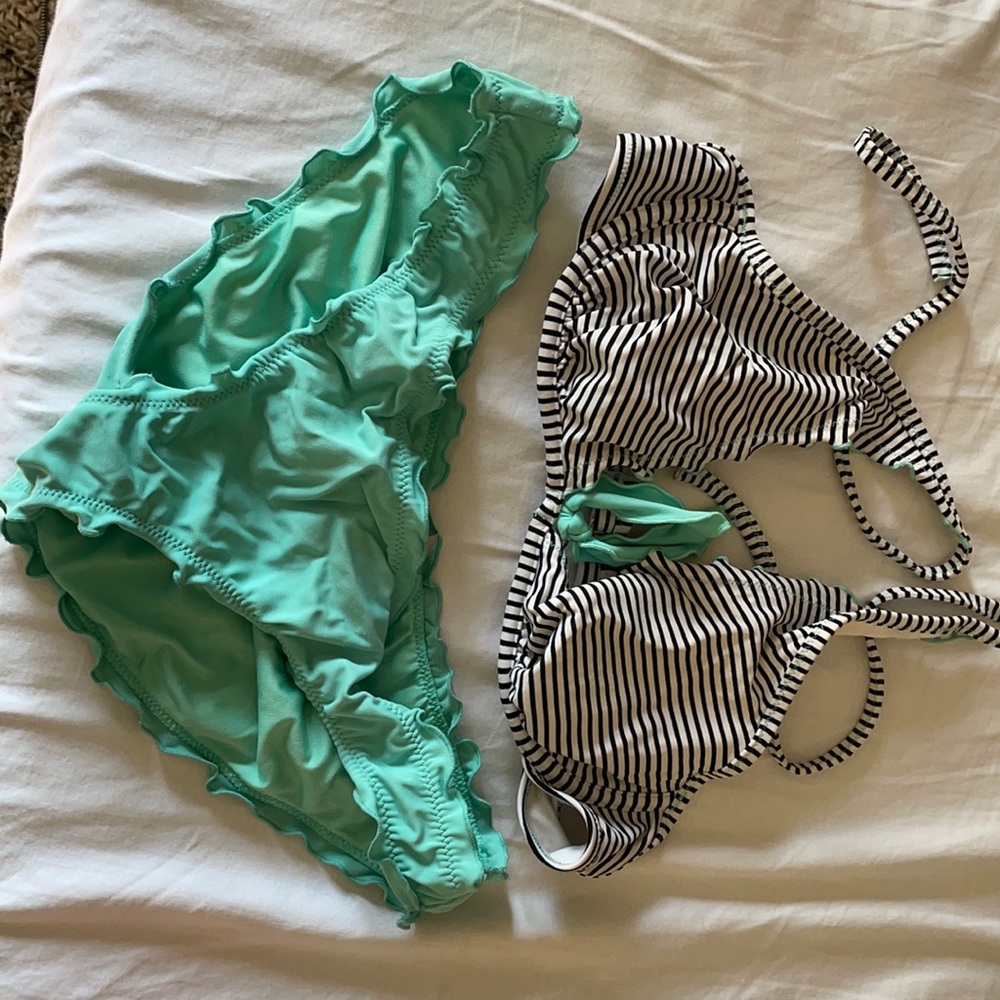 Victoria secret swim suit. Teal bottoms and black and white stripe top